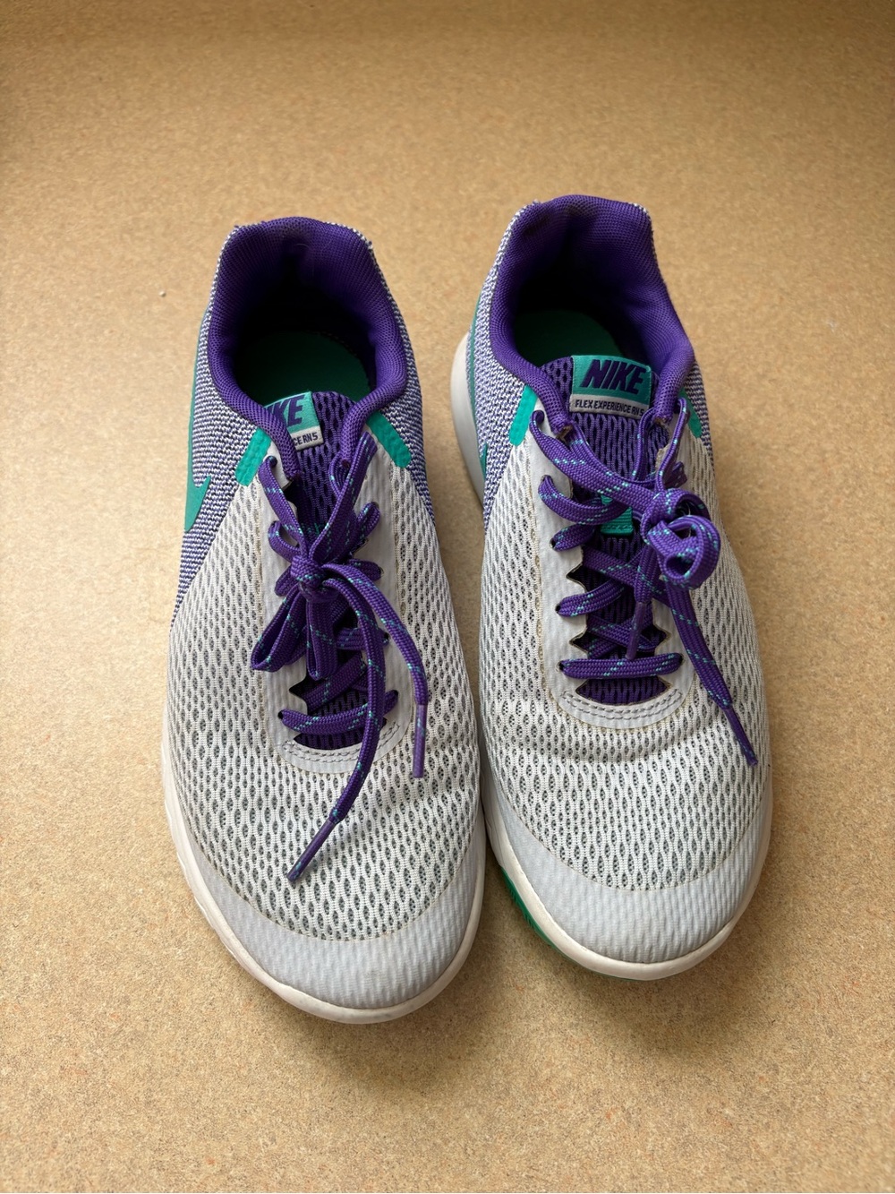 Nike Women's Lavender Running Shoes with Purple and Teal Accents